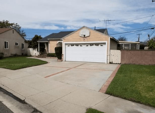 A White Color Garage Door With Vents for a Home