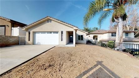 A Property With a White Color Garage Door