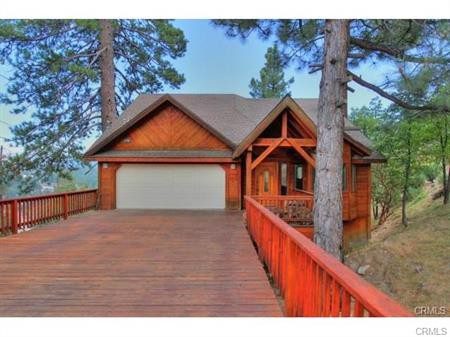 A Wooden House With Panel Wood Flooring in the Woods