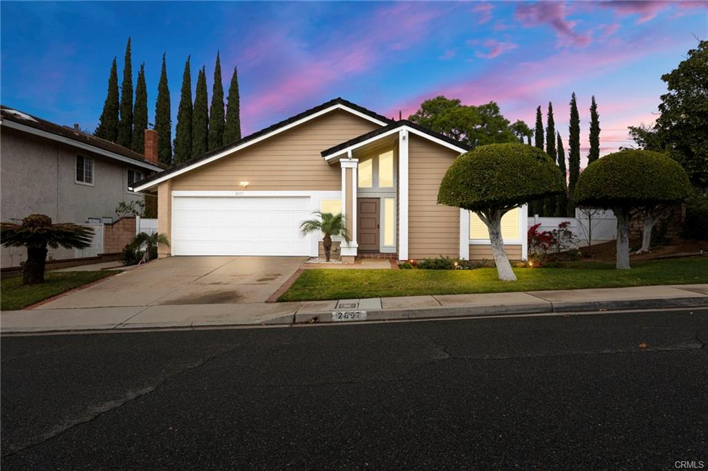 A Panel Pattern Home With a Garage